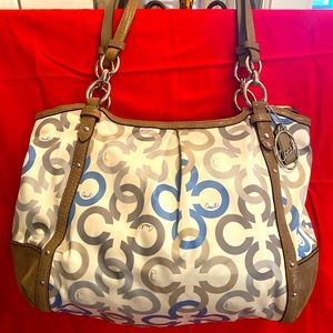 Coach very nice used very little cleaning out my closet